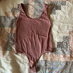 NWOT Skims stretch rib scoop tank bodysuit in rose clay color